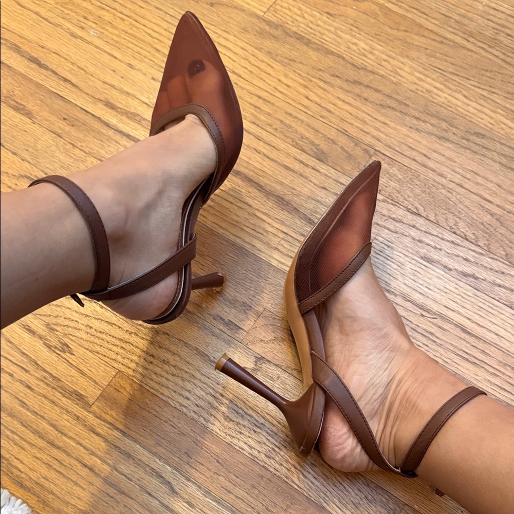 Well worn heels with mesh toe
